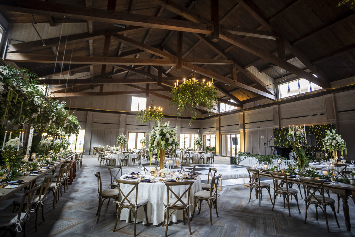 Wedding Reception venue with tables and chairs set up.