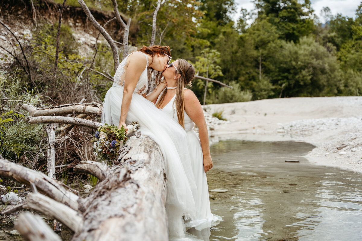 romantic couple in Soča Valley river elopement