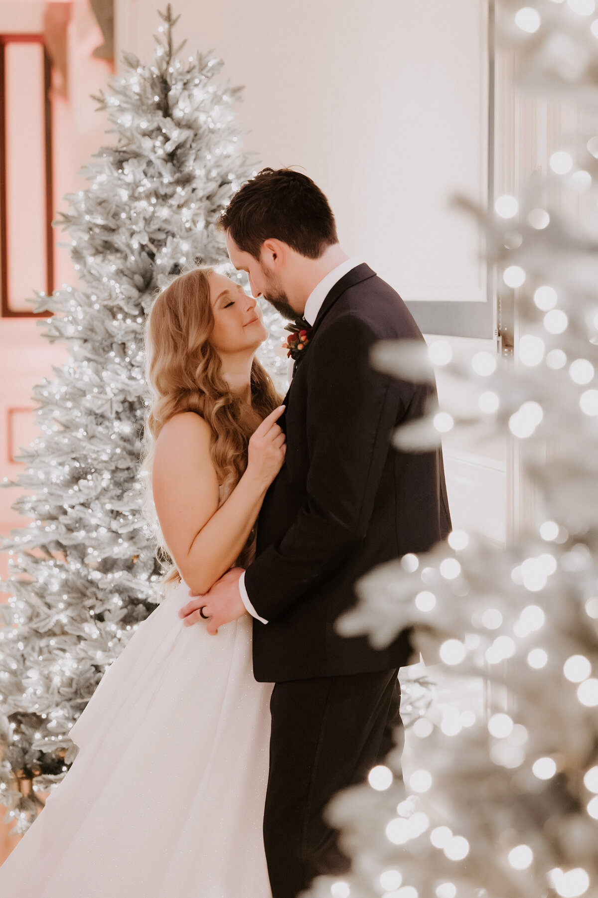 christmas trees and wedding couple
