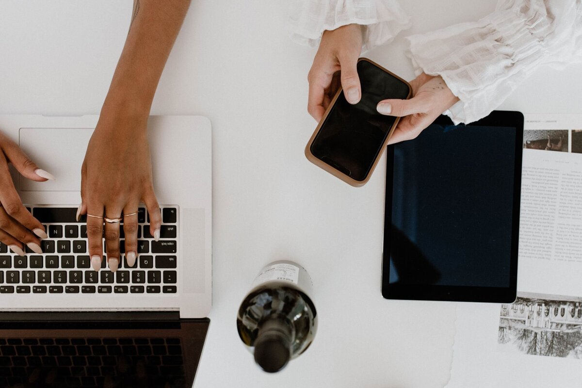 Women Typing Emails on Computer and Phone