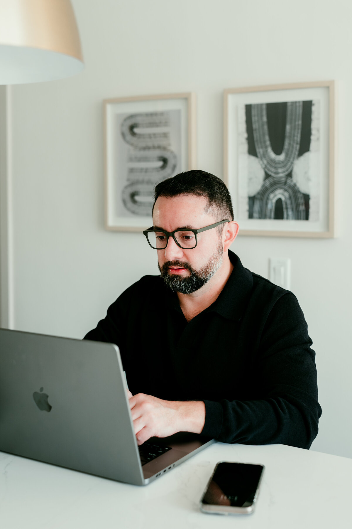 Casual lifestyle dating profile photo of a Minneapolis man working from home, designed to show personality and real life on dating apps.