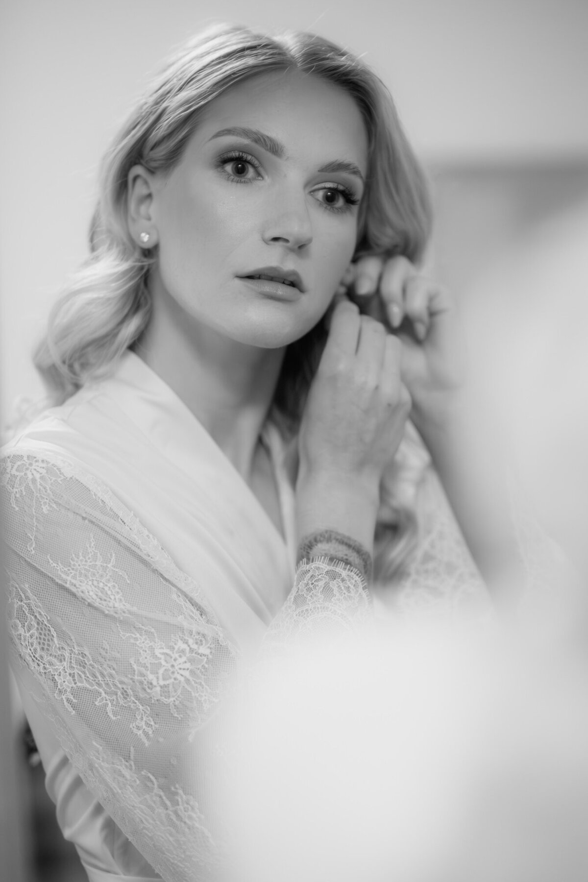 Black and white bridal portrait during getting ready.