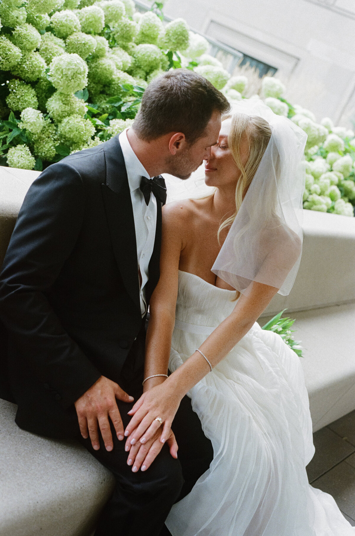 Editorial wedding photography captures ceremony moments at Old Post Office Chicago with Lauren Alatriste's fashion forward approach, showcasing architectural beauty while maintaining sophisticated luxury wedding imagery and authentic emotional storytelling.