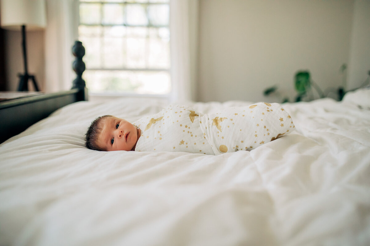 newborn-baby-in-bed