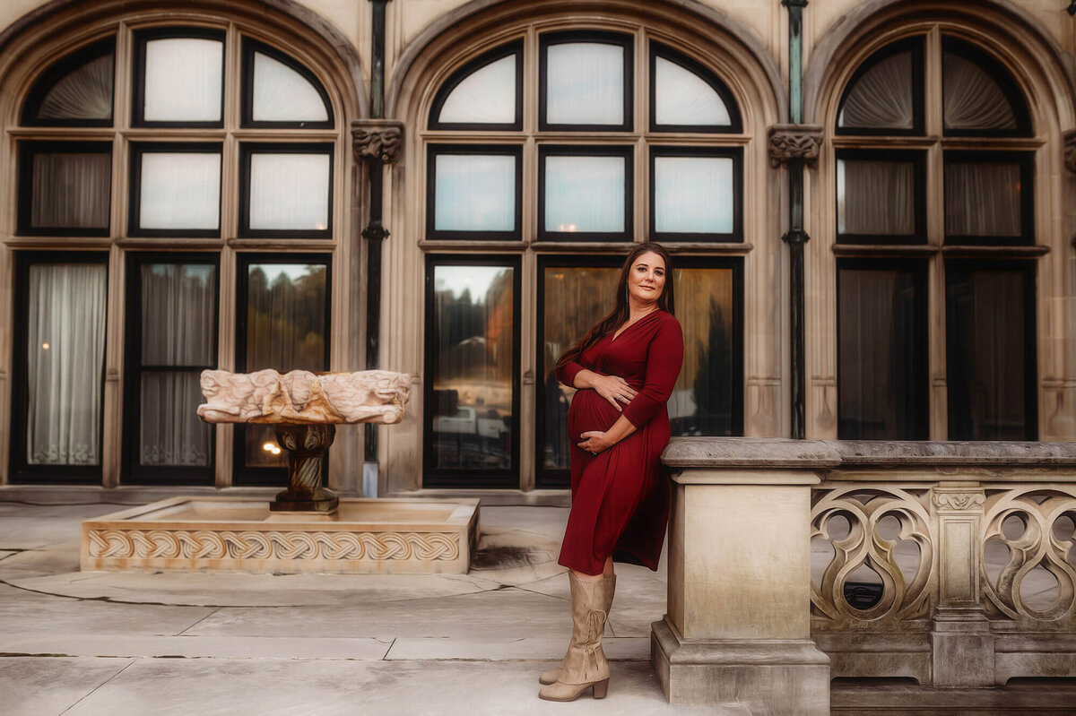 Pregnant mother poses for Maternity Portraits at Biltmore Estate in Asheville, NC.