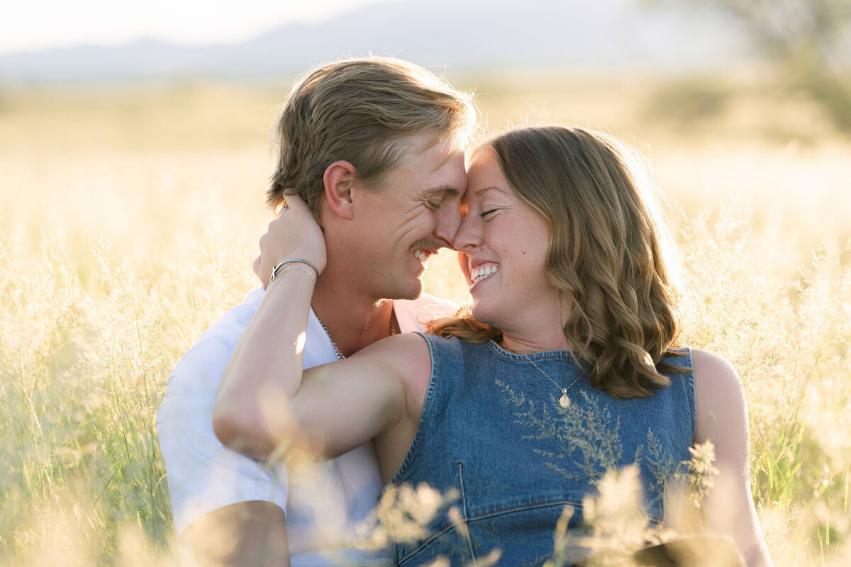 Tucson Arizona engagement photography with saguaros and dry grass