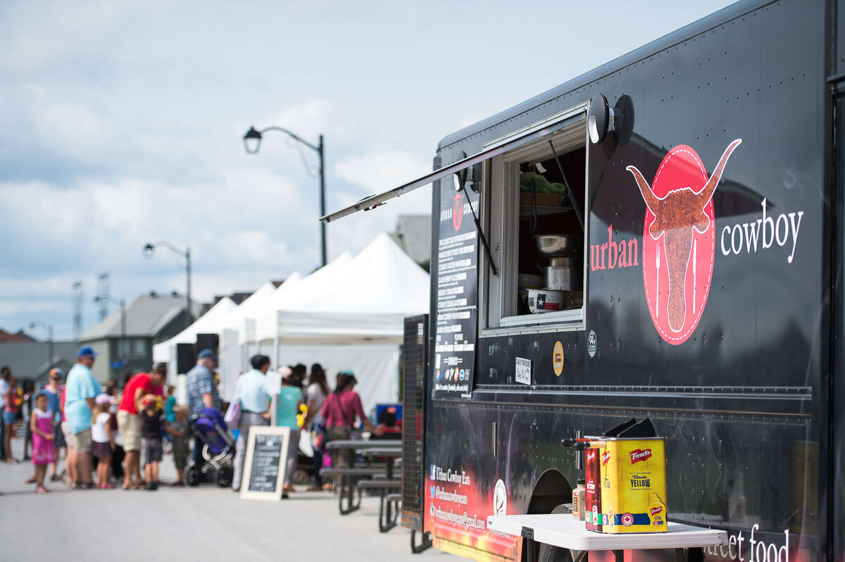 Ottawa event photography showing food vendors as part of a corporate children's event.  Captured by JEMMAN Photography COMMERCIAL