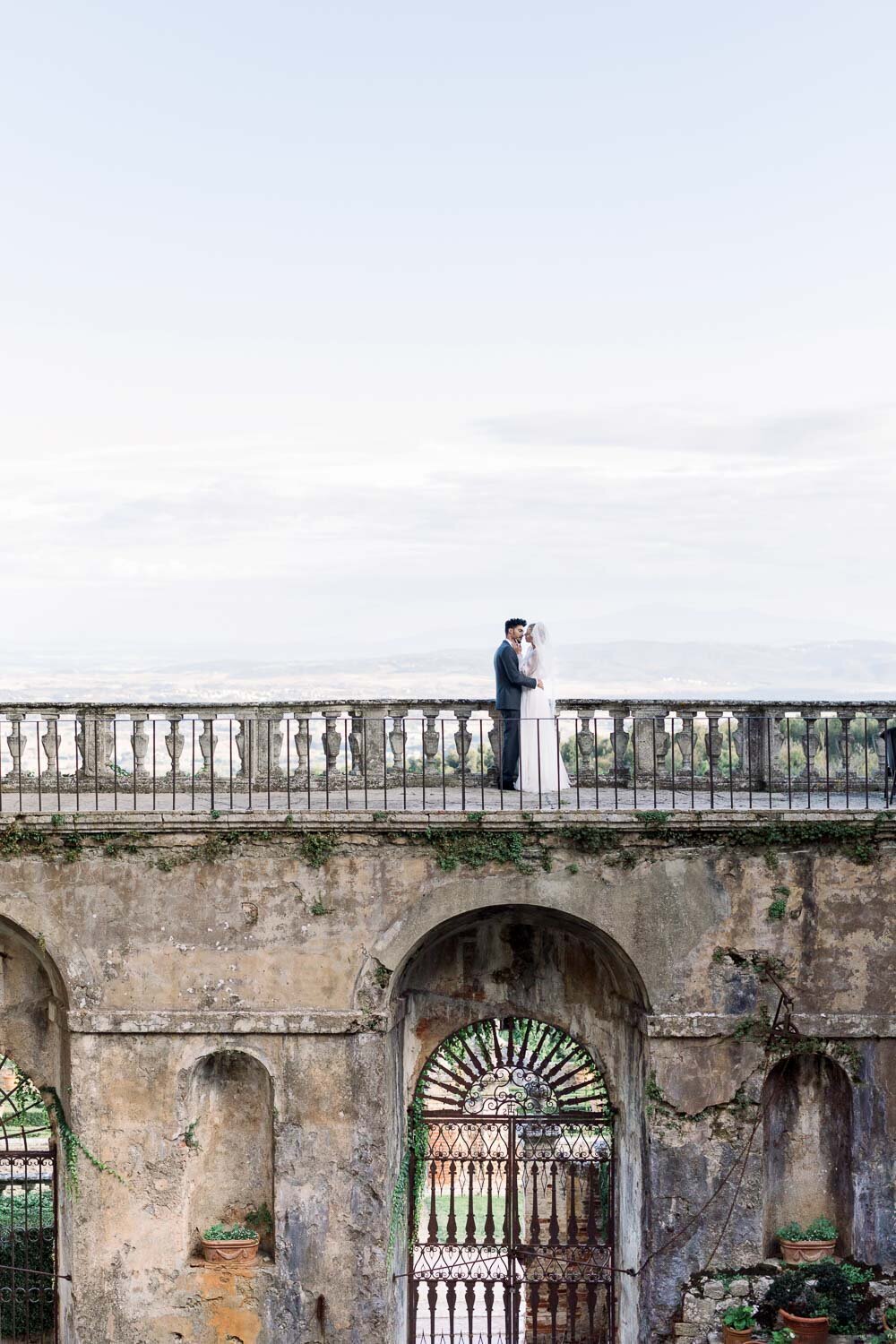 bride and groom in historical castello di celsa