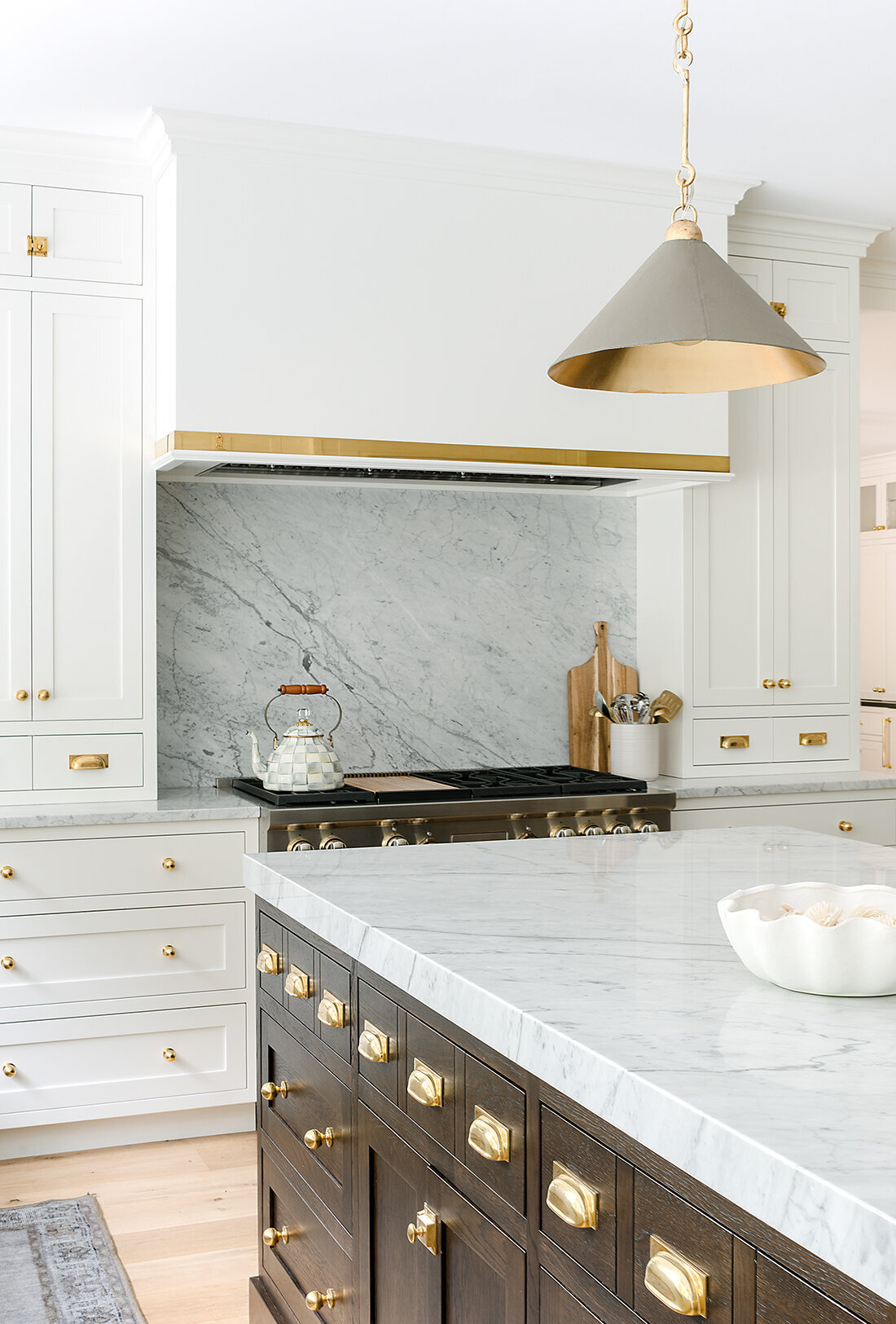 bright white kitchen cabinets with dark wood island