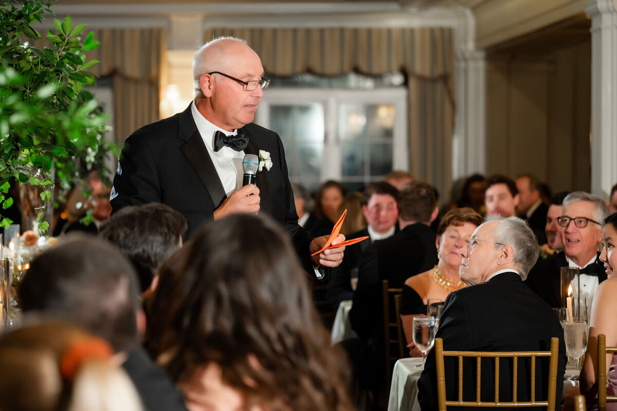 dad giving wedding speech to guests before they eat dinner in the dining room at pittsburgh golf club