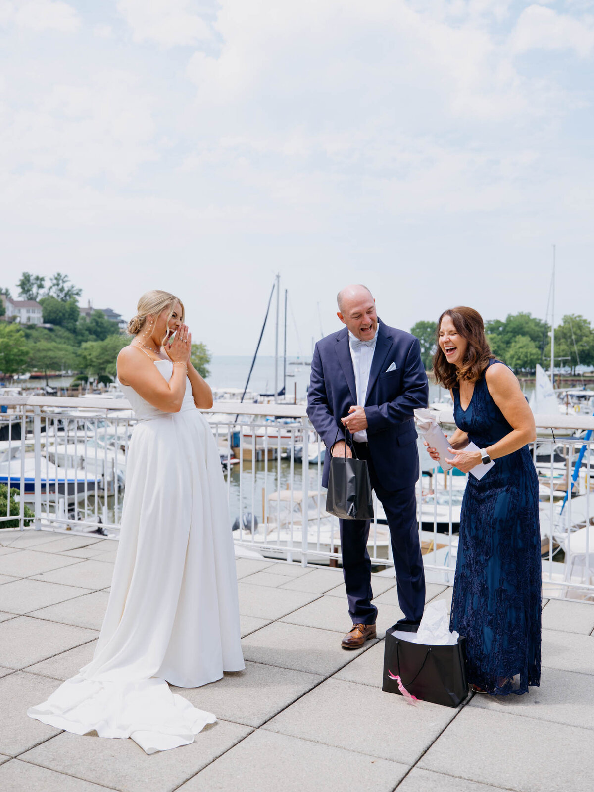 Bride gifting her parents a gift at Cleveland Yachting Club