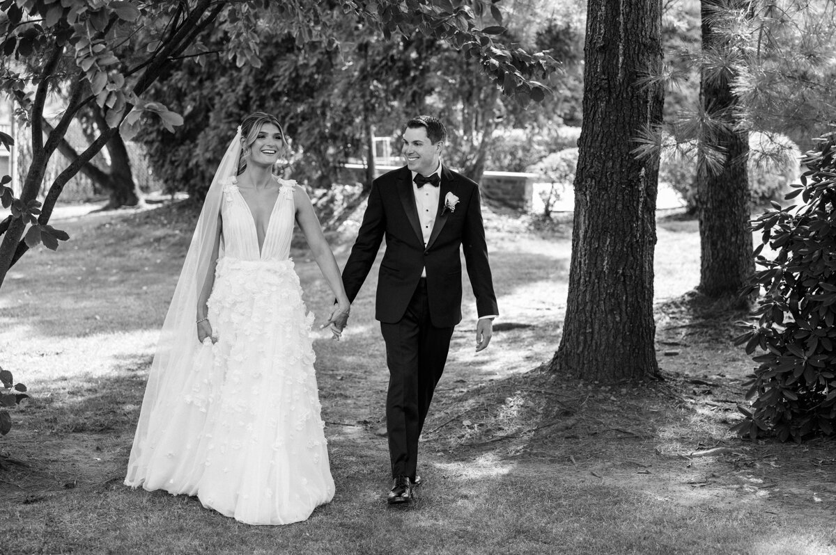 A classic ight and airy wedding photo at Bonnet Island Estate's chapel during a costal themed summer wedding