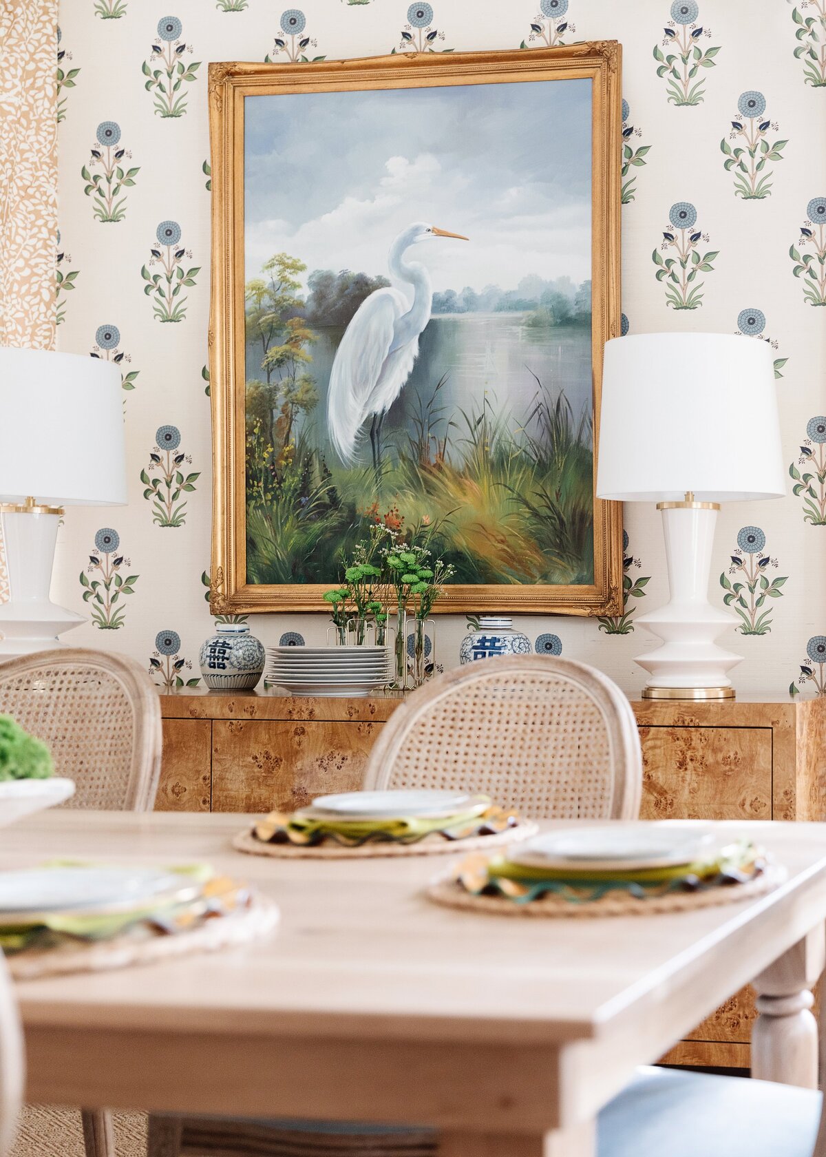 oyster creek studios oak forest remodel  heron painting and side table in dining room