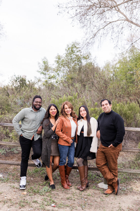 family-of-five-leaning-on-fence-Bonita-San-Diego