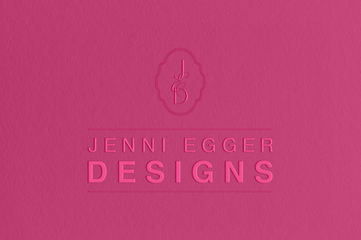a mockup of a stylish logo on pink paper