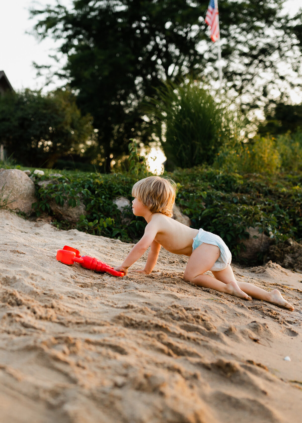 boy-playing-sandy-beach