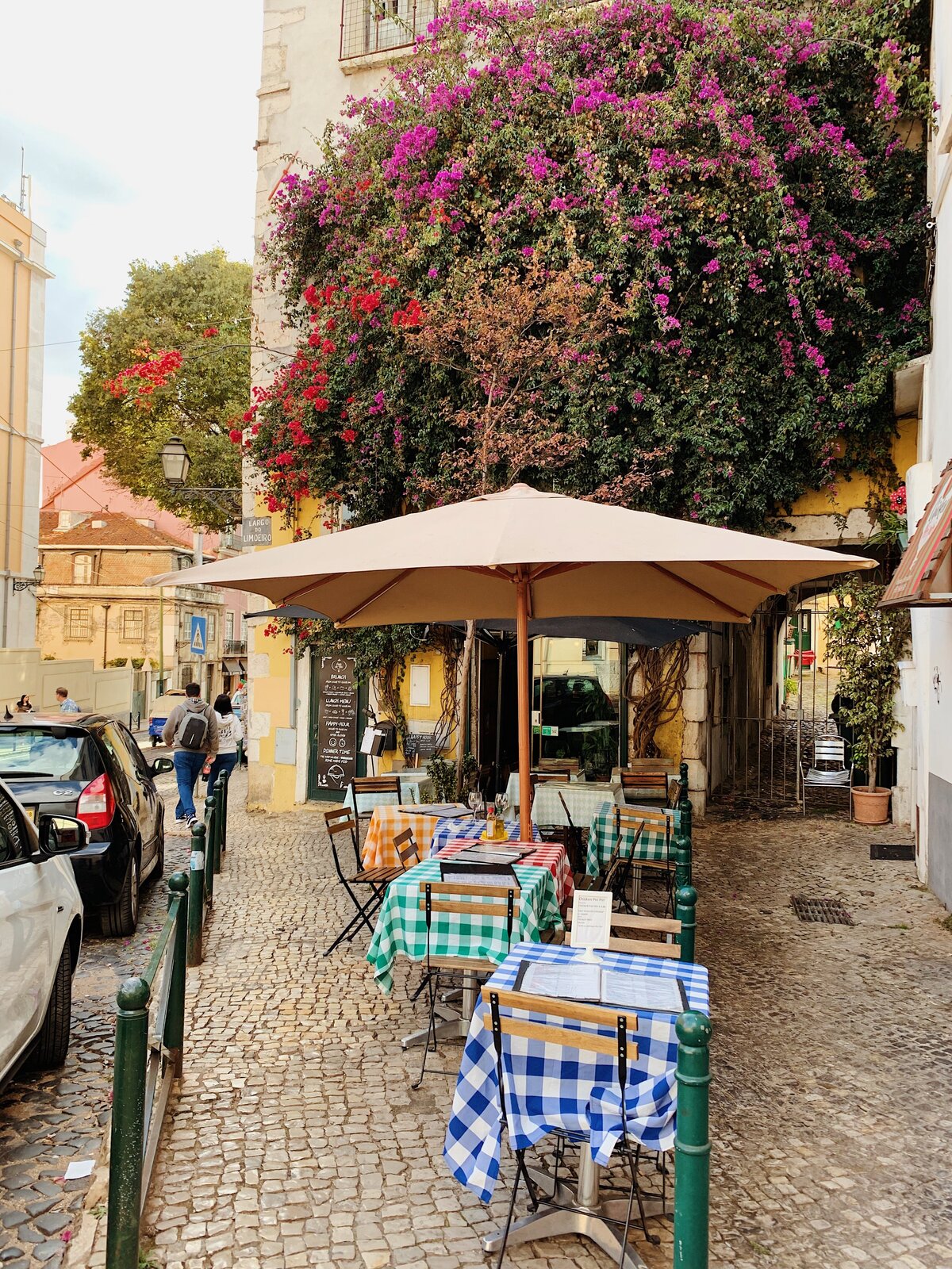 Lisbon cafe outside with patterned tablecloth