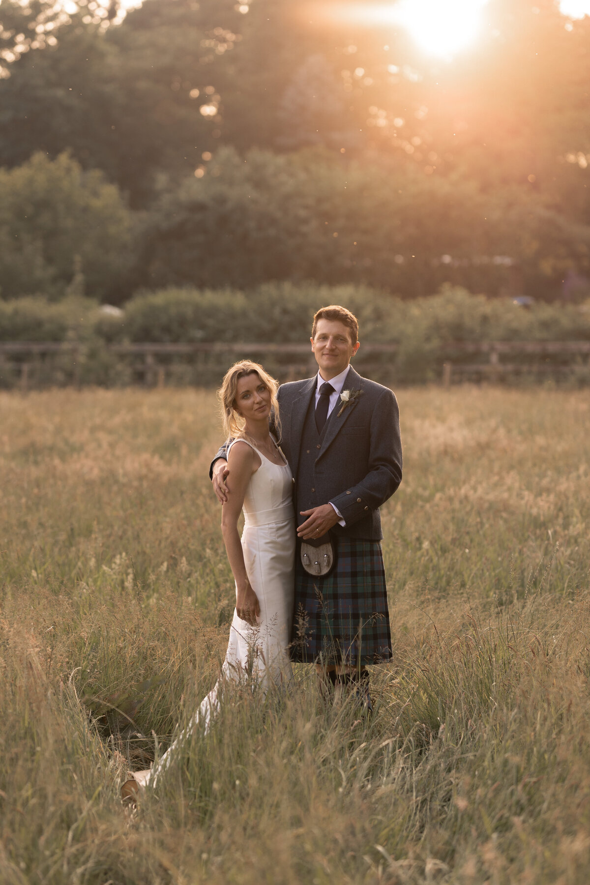 Golden hour editorial wedding photography at Devon marquee wedding