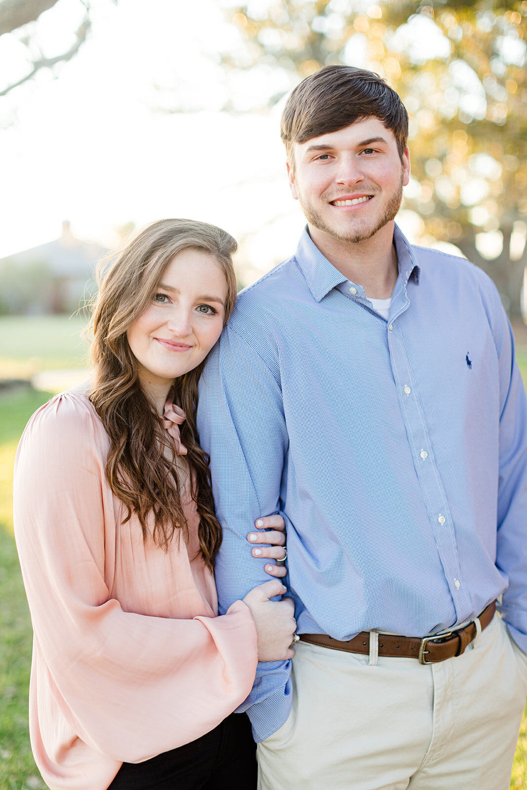 Engagement portrait of couple embracing; The Grand Hotel; Point Clear; Fairhope, AL
