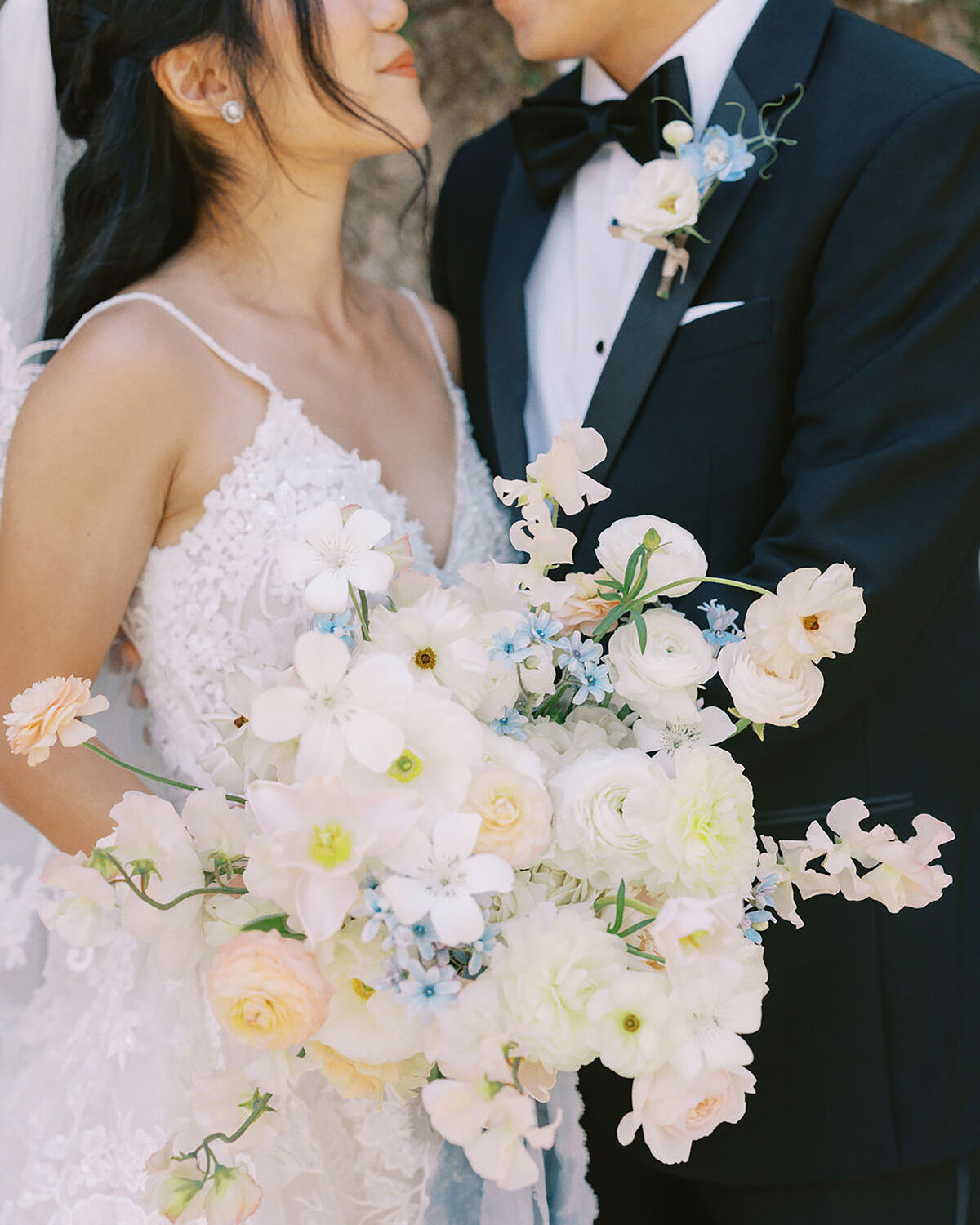 east bay bride holding bridal bouquet for first look