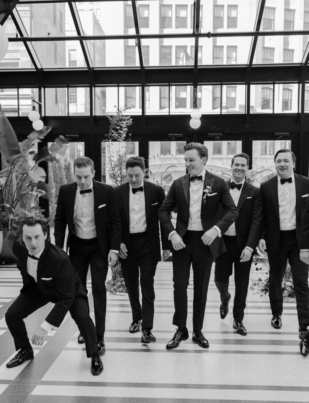 goofy groomsmen photo, candid wedding photography in Detroit, Shinola Hotel