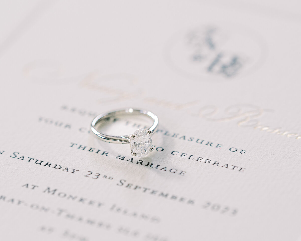 Engagement ring on wedding stationery at Monkey Island Estate wedding