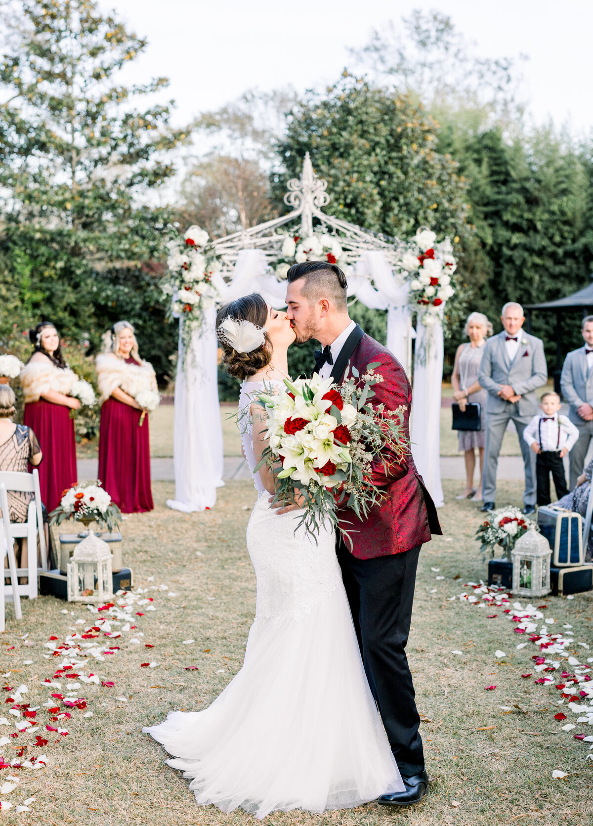 First Kiss as husband and wife outside front lawn ceremony at The Thompson House and Gardens, Bogart, GA 