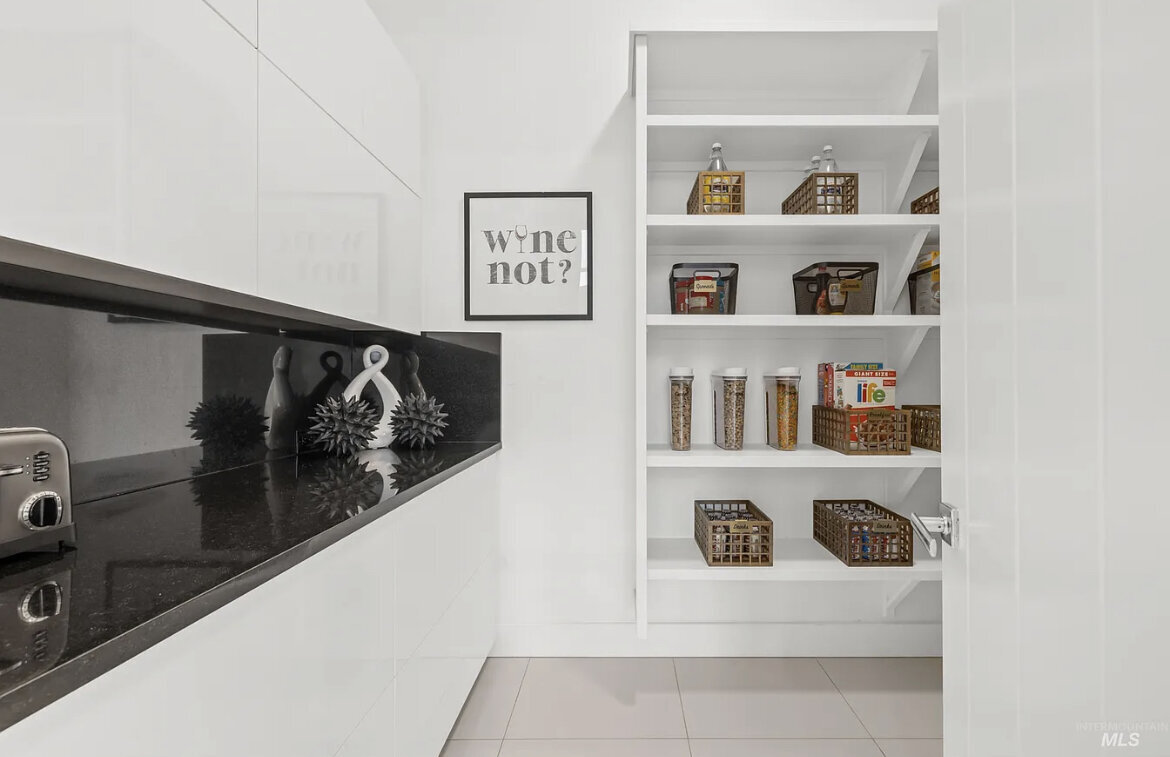 baskets on shelves black kitchen counter