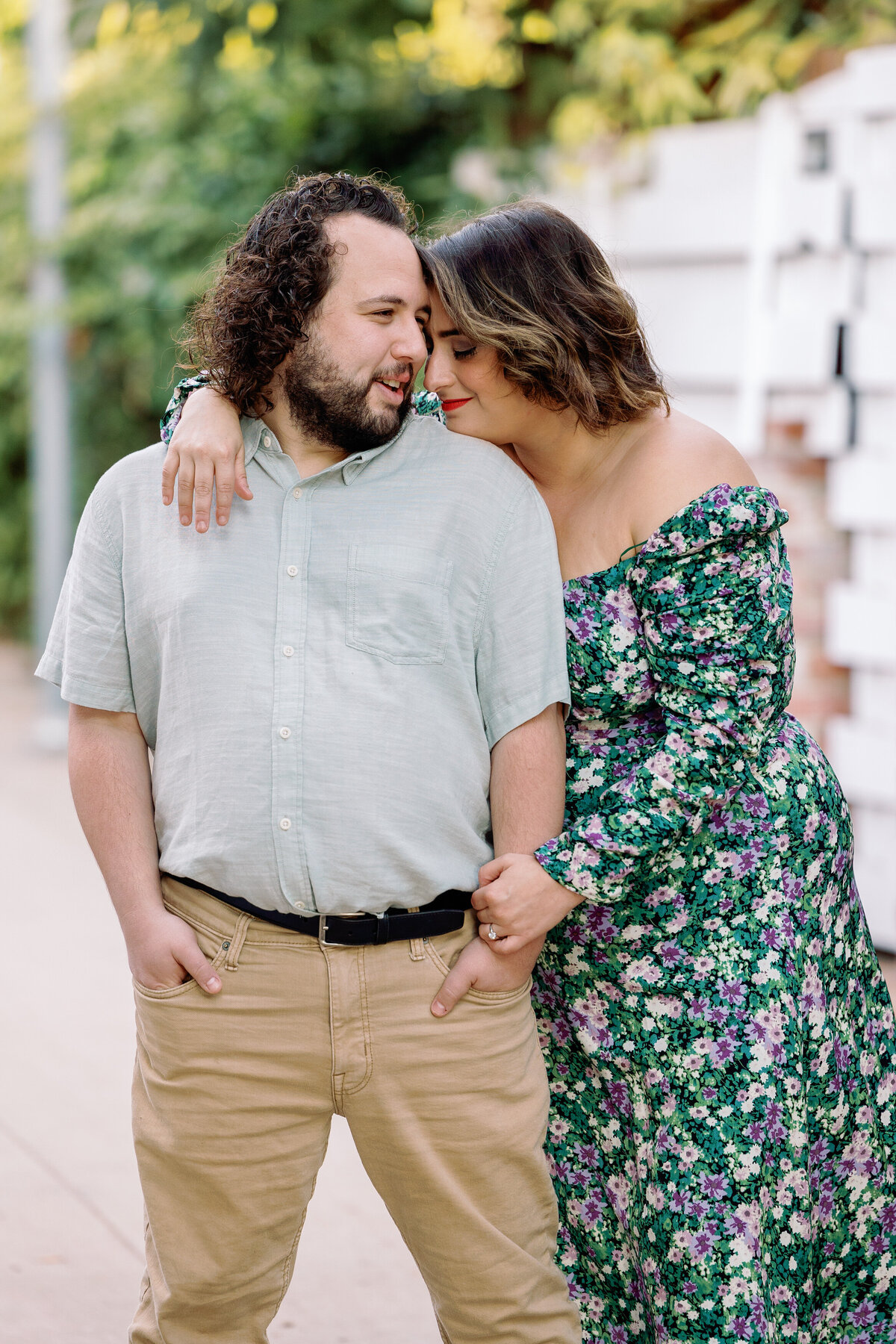 A person resting their chin on their partner's shoulder