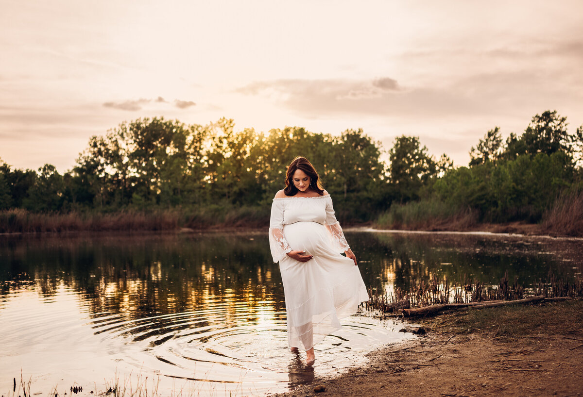 pregnant mother walking in water