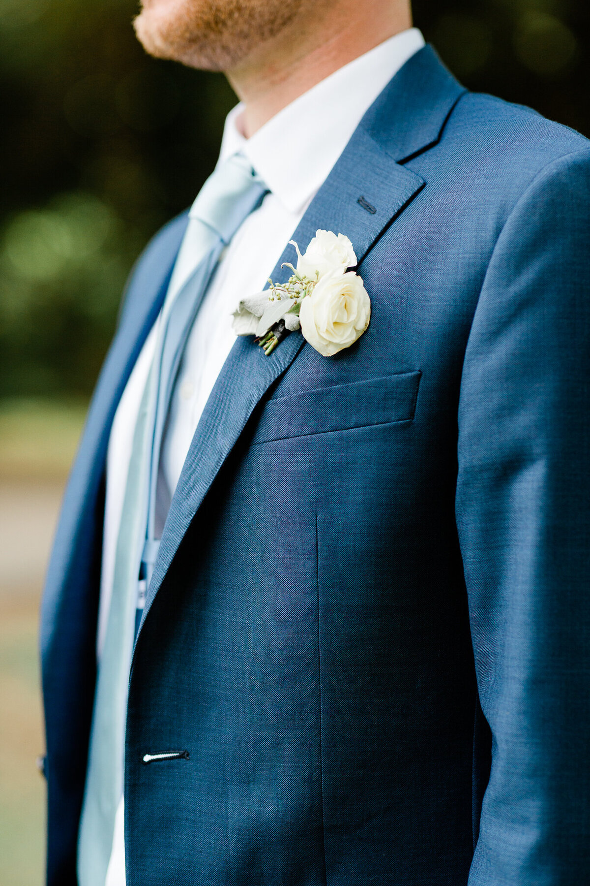 Groom Portrait of Suit and Boutonniere