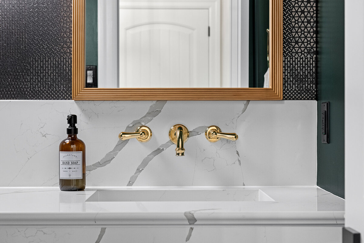 Final image of our moody luxe powder room interior design project.