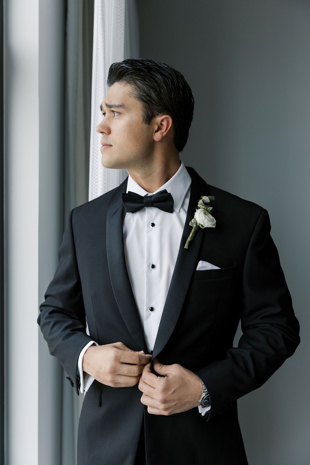 coral-gables-groom-looking-window-5CE-W