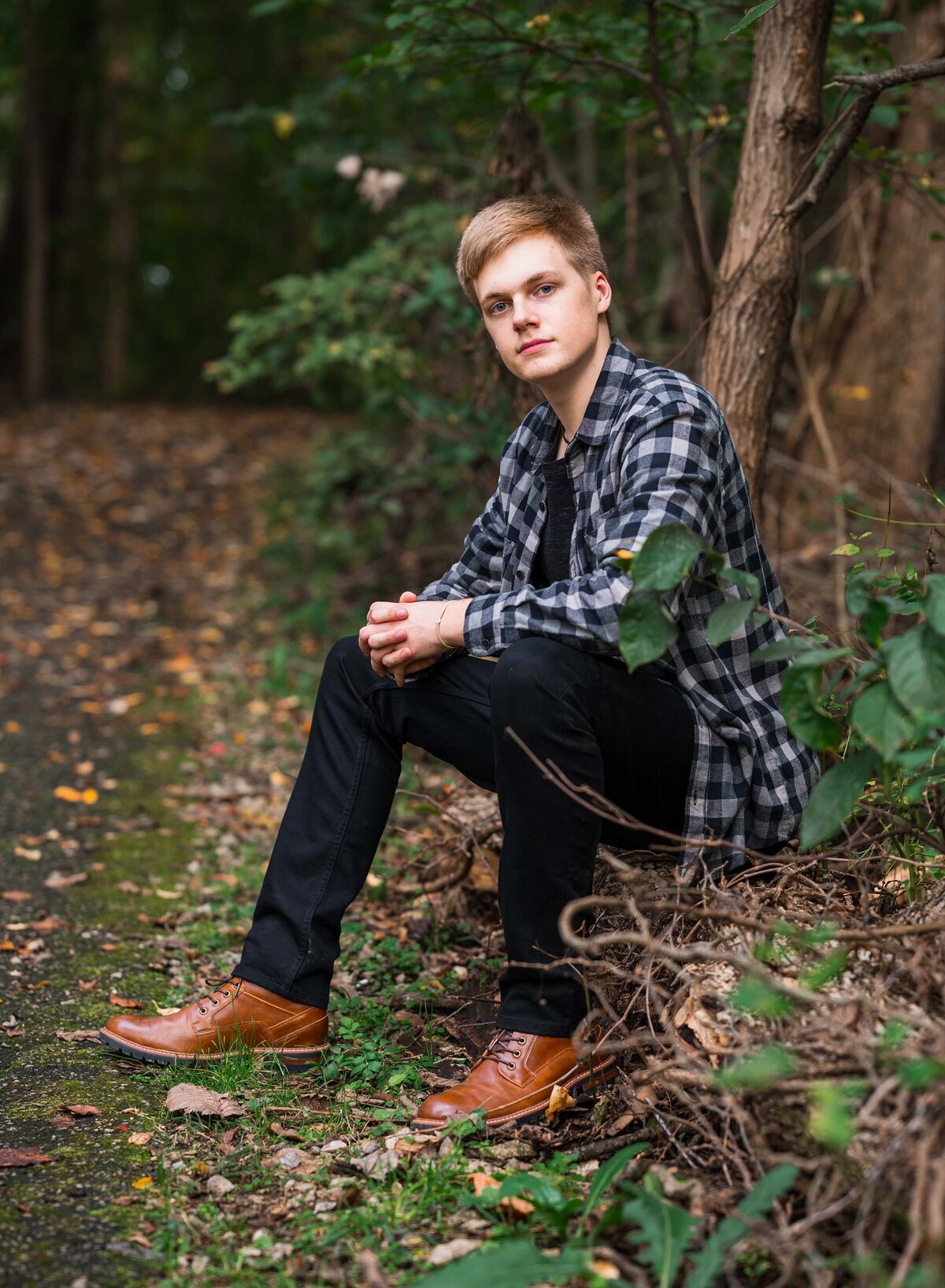 Celebrate your high school senior with personalized portrait sessions, including cap and gown photos, by Leslie Q Photography. Offering both studio and outdoor options to capture their unique personality and milestone. Serving Michiana, Northern Indiana, South Bend, New Carlisle, and surrounding areas.