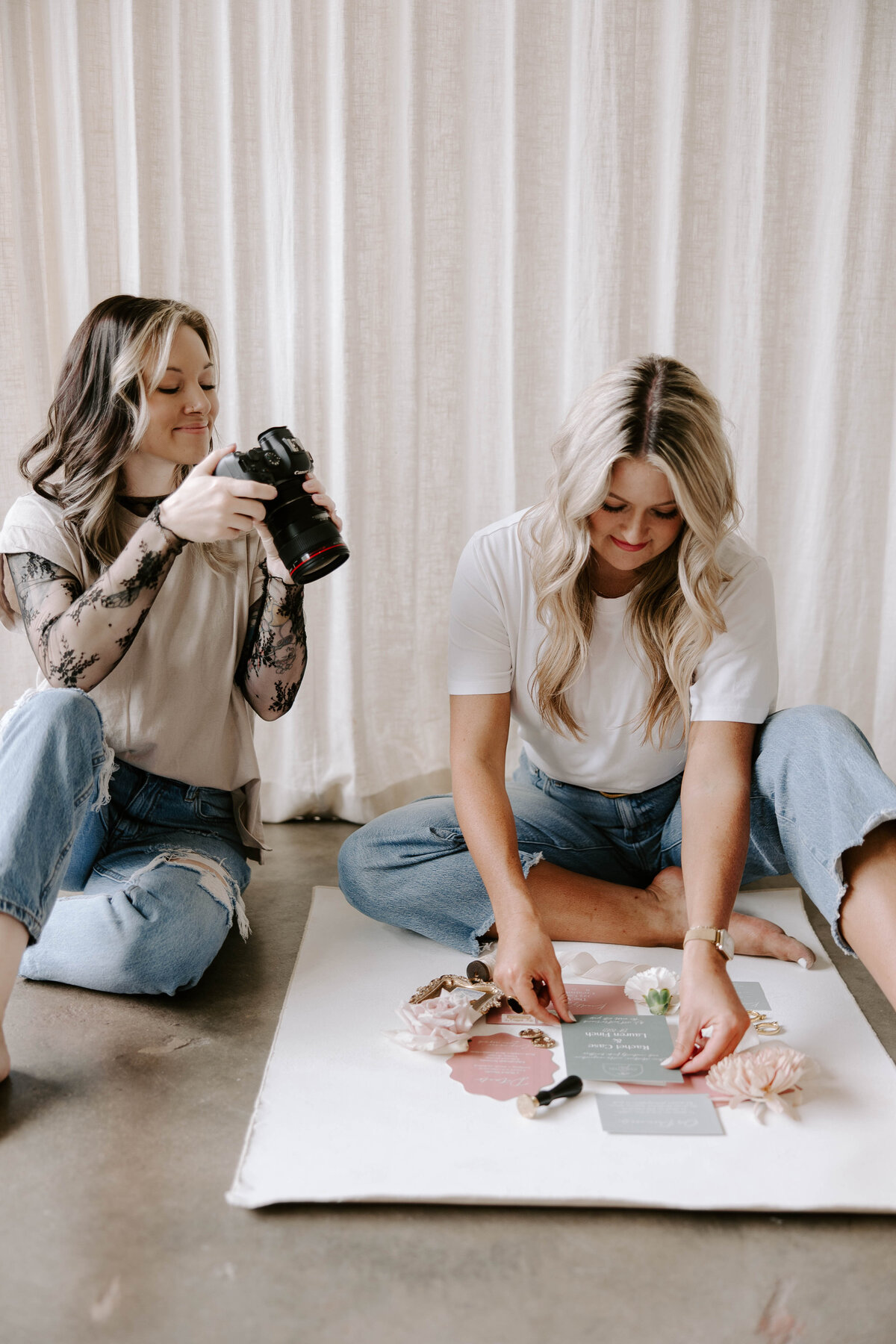 Behind the scenes of a wedding shoot during hands-on learning at the retreat.