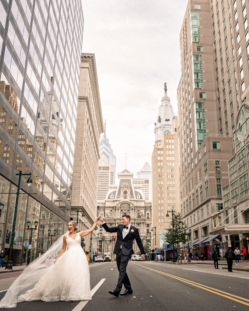 Bride and Groom dance in front of City Hall in Philadelphia-1