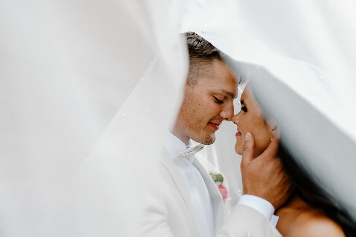 bride and groom running hand in hand