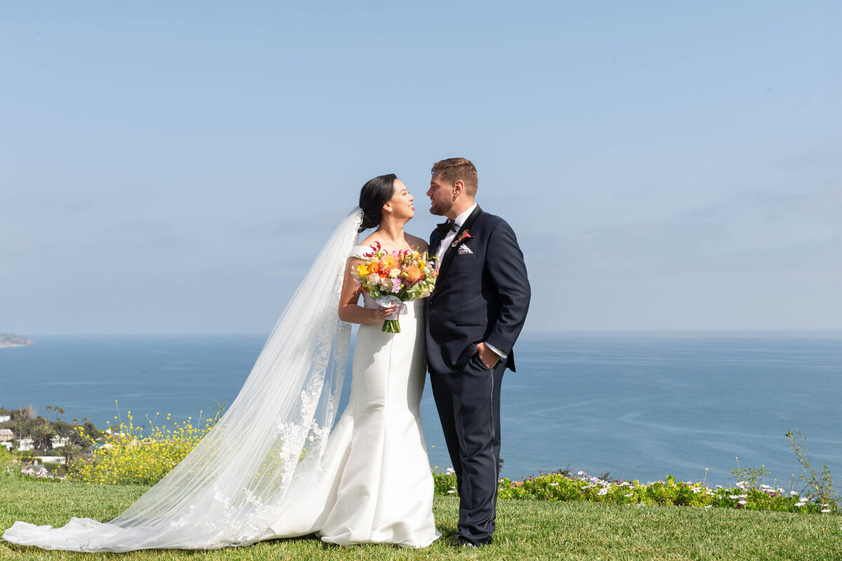 Bride and Groom overlooking the Pacific Ocean