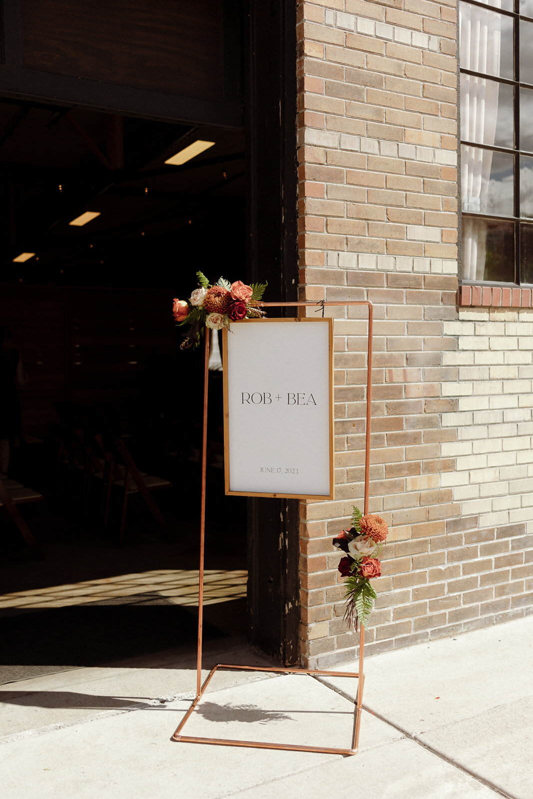 Wedding welcome sign in Denver Colorado with fall flower accents.