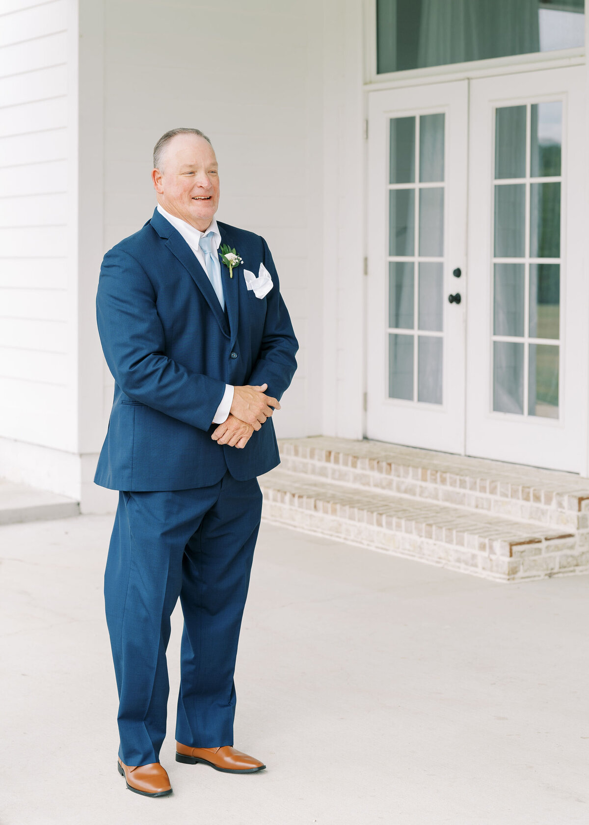a dad seeing his daughter in her wedding dress