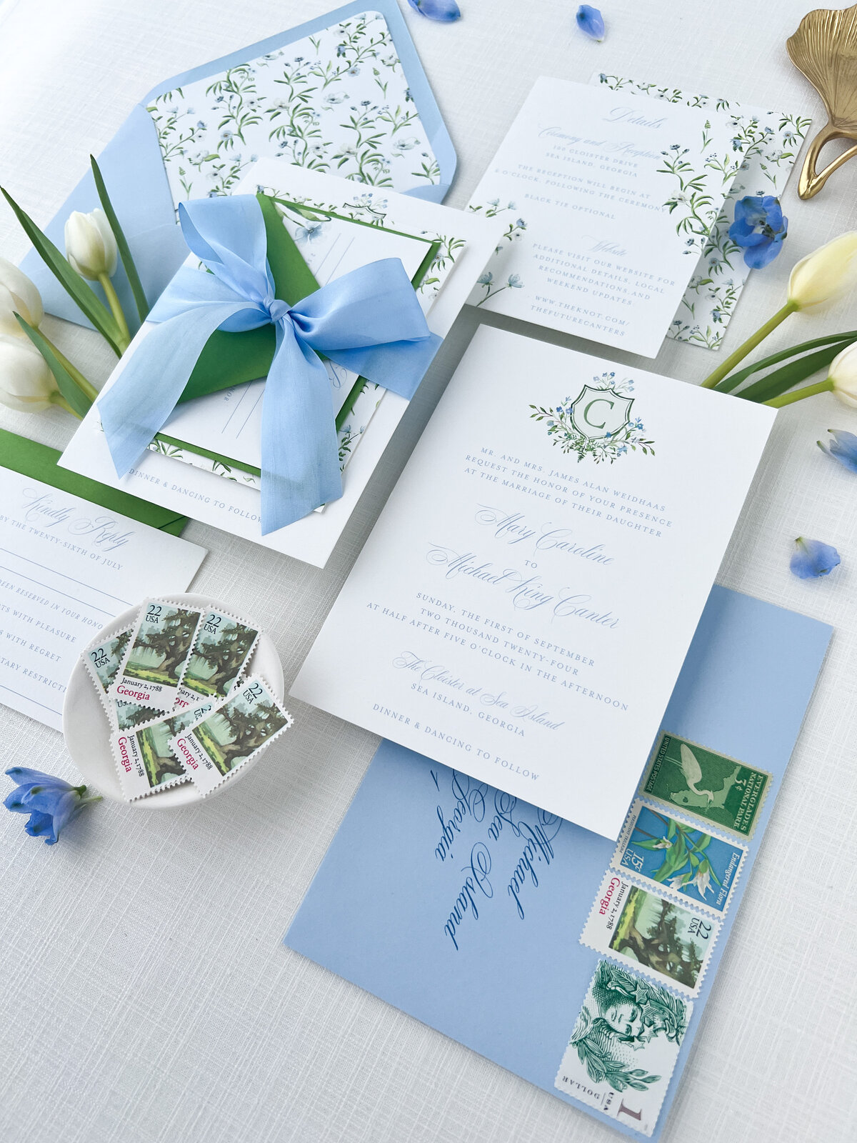 wedding stationery with a blue and green botanical theme