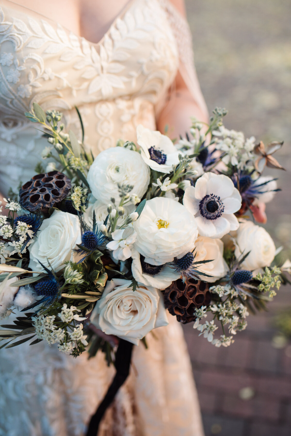 Luxury bouquet with roses, anemones and ranunculus by Haven Floral Company