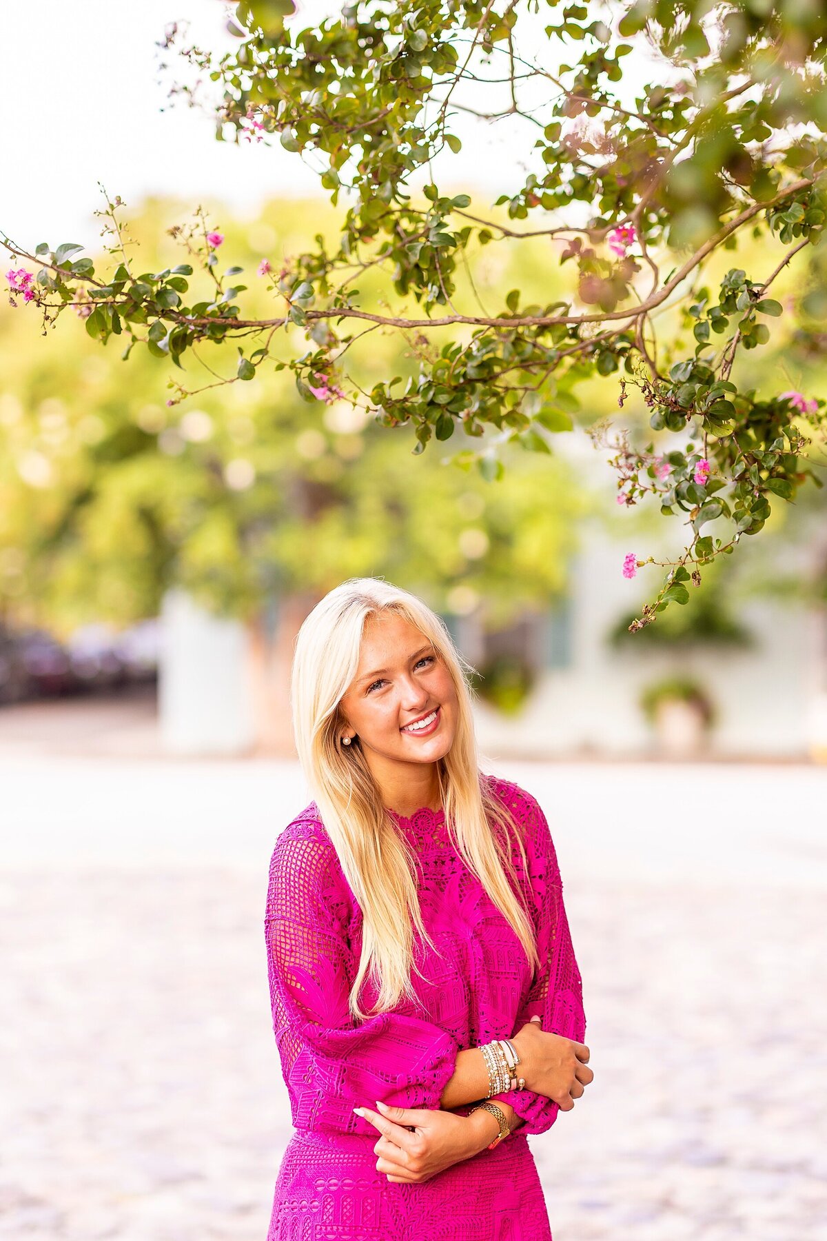 Candid senior portrait in Charleston, SC showcasing personality, elegance, and timeless style
