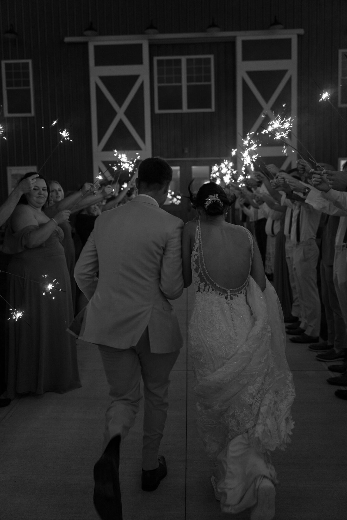 Just Married Couple Under Sparklers