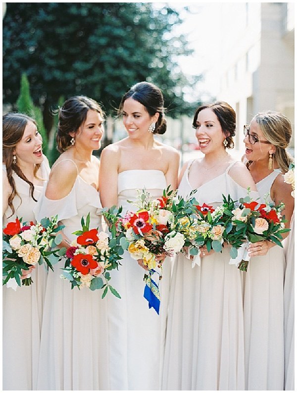 Bridesmaids in long cream dresses © Bonnie Sen Photography