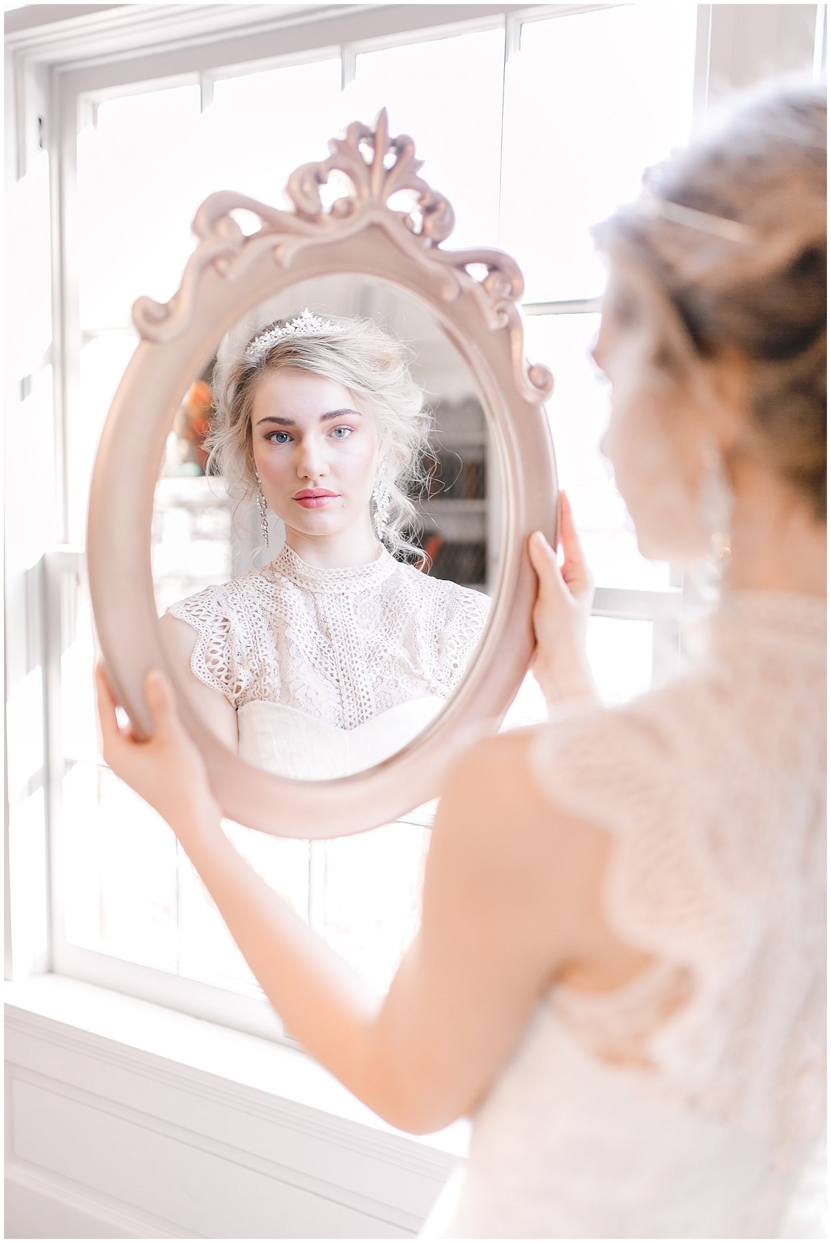 bride looking in mirror