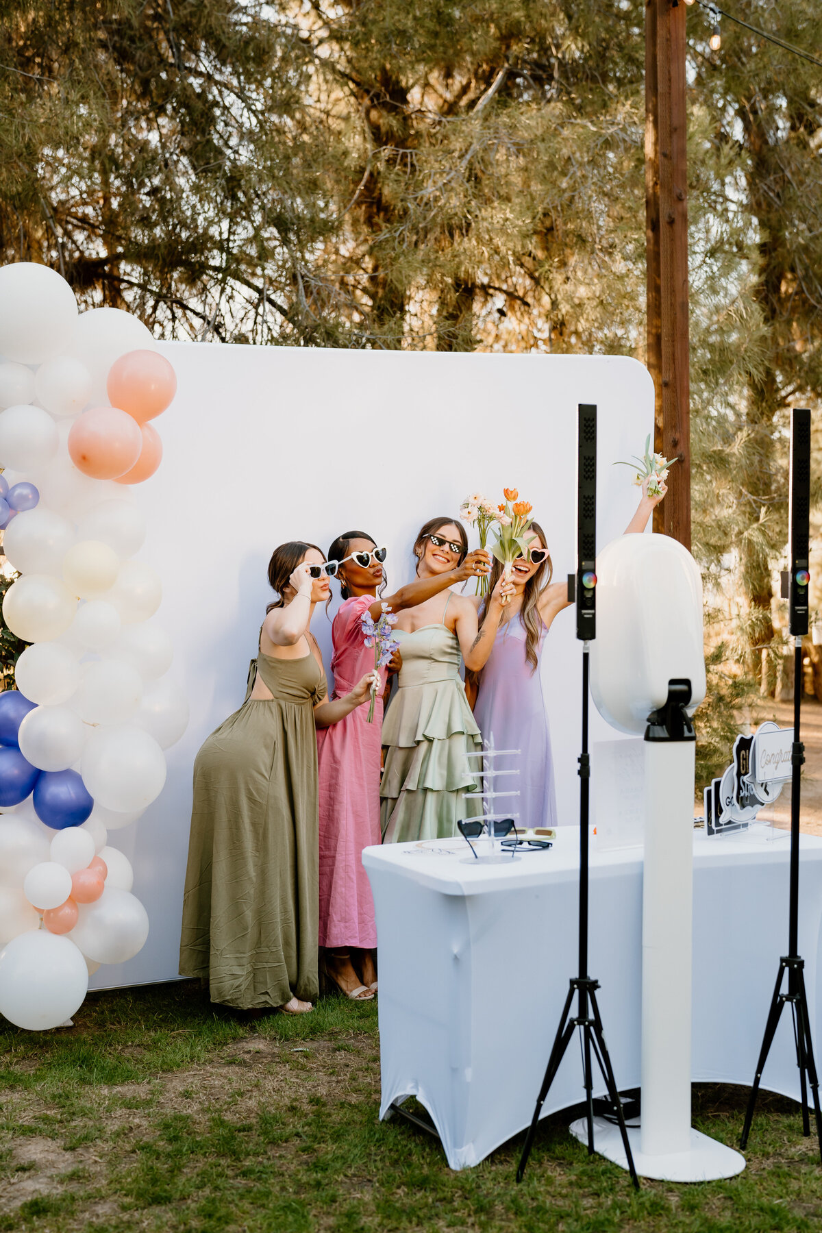 Photobooth with bridesmaids posing
