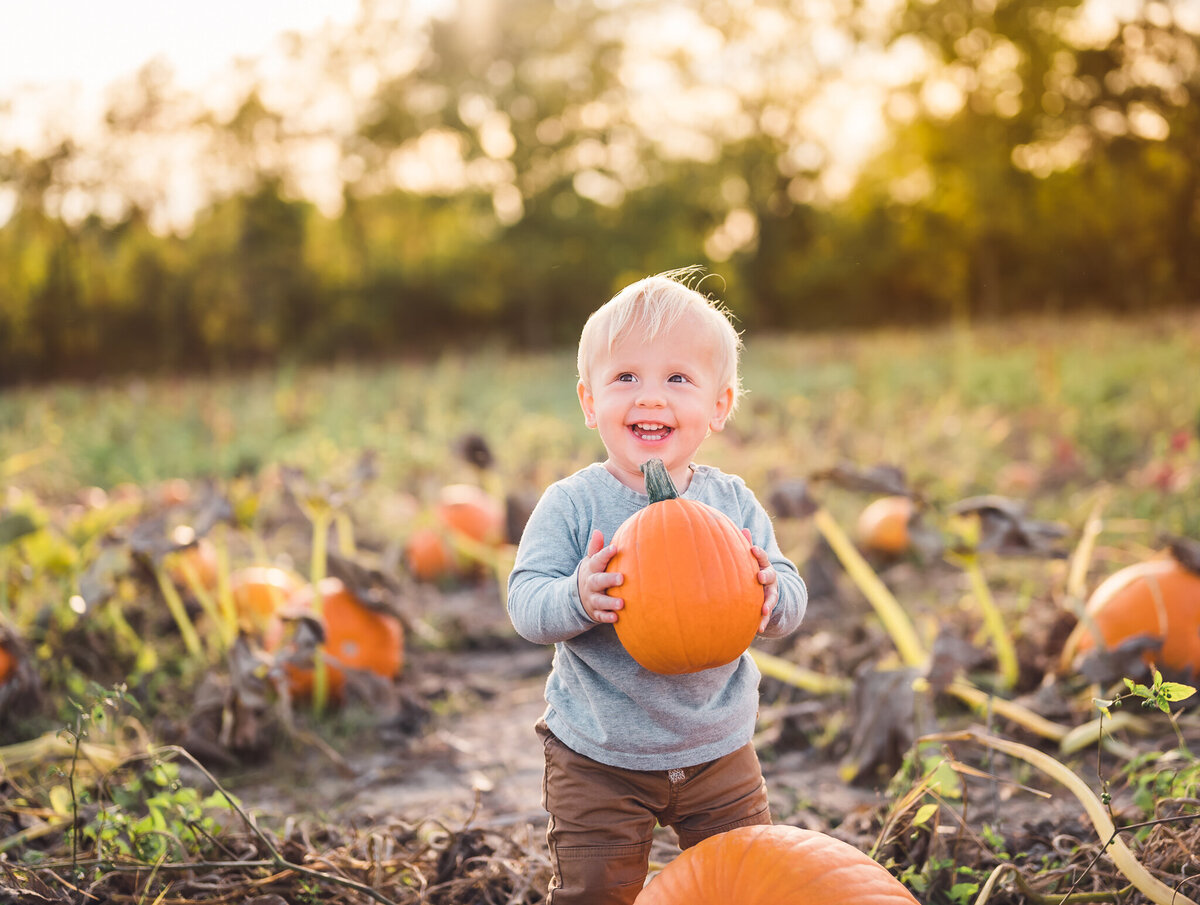 Little boy at the pumpkin patch
