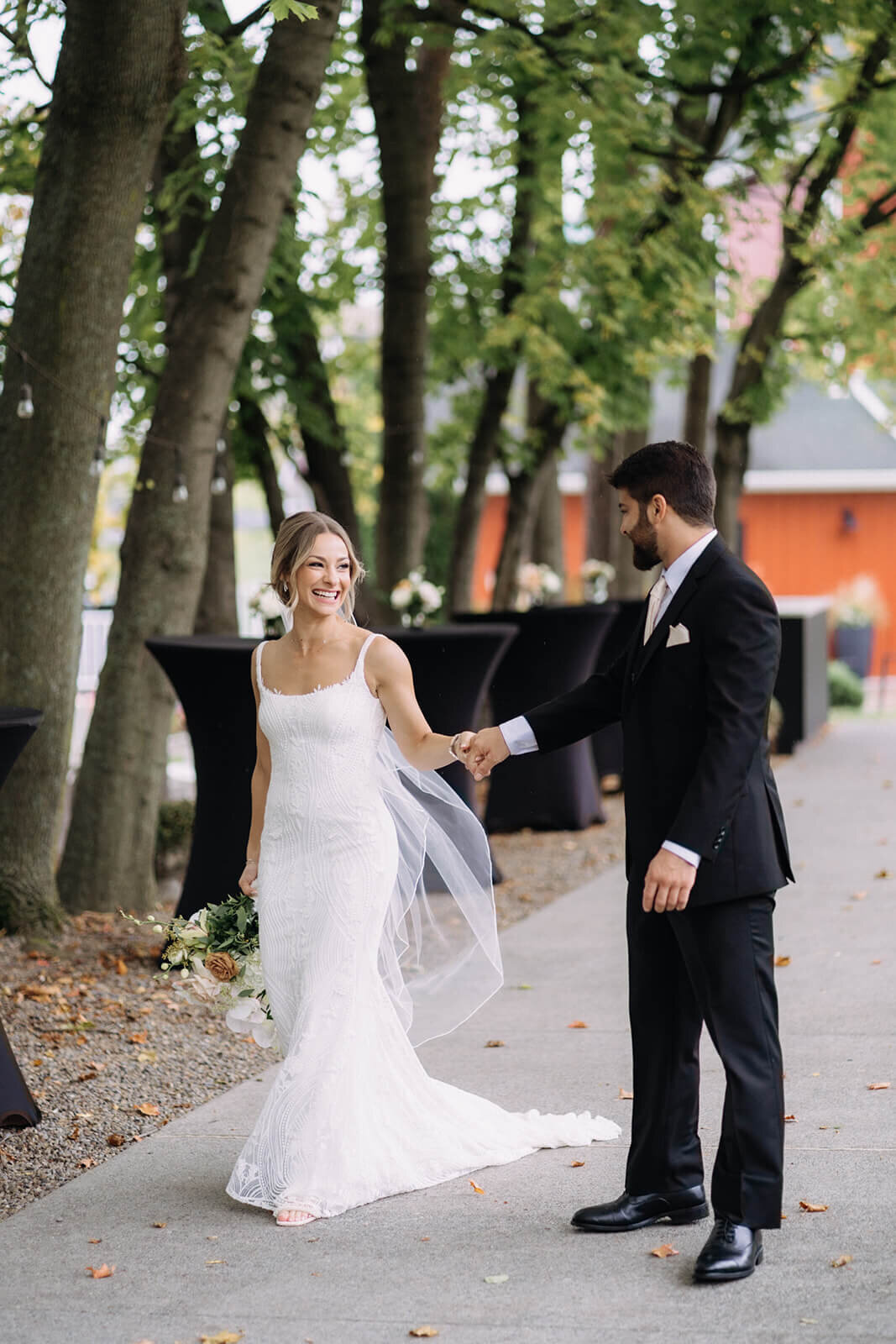 Bride and groom walking along