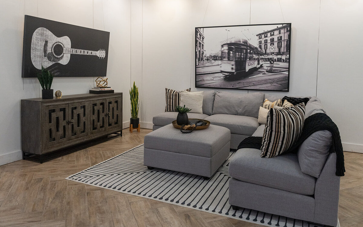 grey couch seating area laid back room
